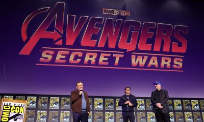 Concept art-style image showing Tobey Maguire’s Spider-Man, Hugh Jackman’s Wolverine, and Michael Fassbender’s Magneto standing together in a destroyed multiverse battlefield with the Avengers: Secret Wars logo in the background.